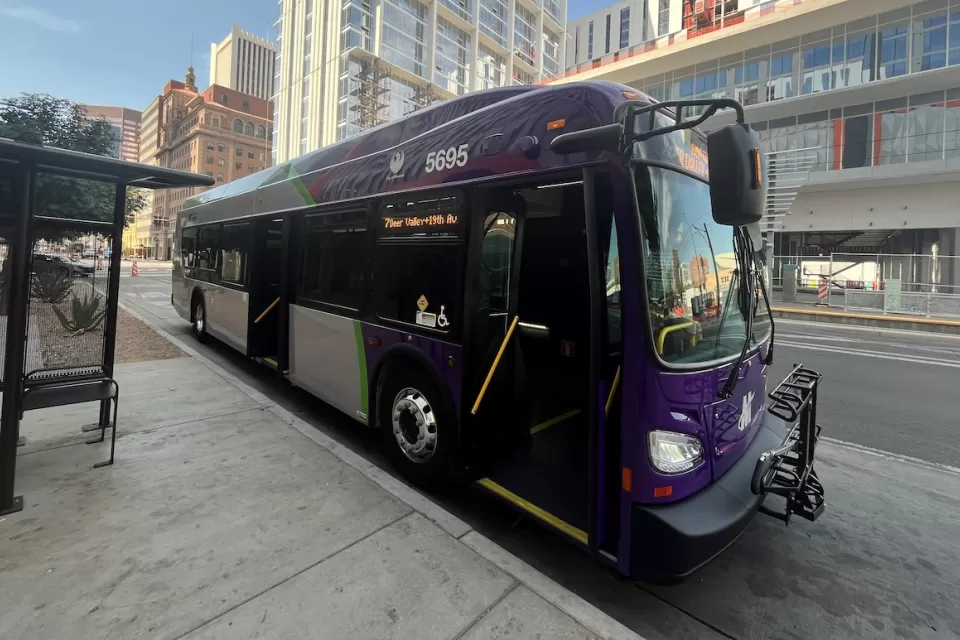 Black and purple hybrid Phoenix Public Transit bus.